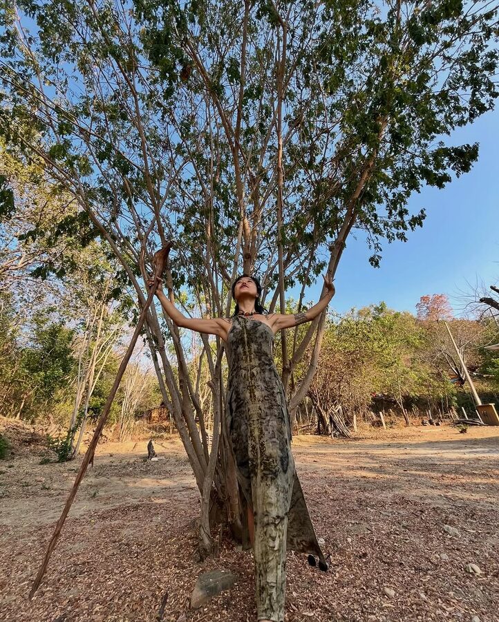 botanical print dress among trees